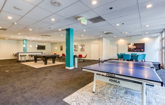 play a game of ping pong in our games room at our apartments