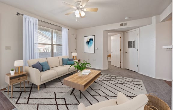 a living room with a white couch and a coffee table at Chapel Ridge of Gallatin, Gallatin