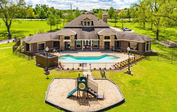 an aerial view of a large house with a swimming pool at Highland Hills, Dallas, TX, 75241