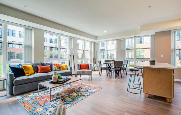 Living Room With Oversized Windows And Doors at The Legends at Berry 62+ Apartments, St. Paul, 55114
