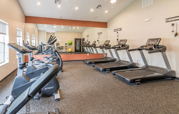 our gym has a lot of cardio equipment for our residents to use at Pinewood Apartments, Texas, 77396