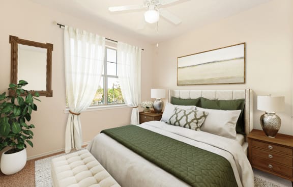 a bedroom with a bed and a ceiling fan at The Cesera 55+ Apartments, Garland Texas