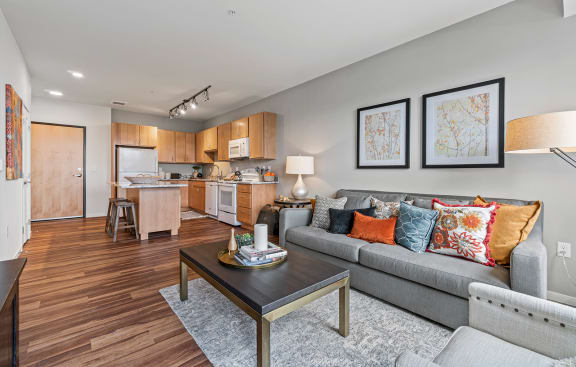 a living room with a couch and a coffee table at Brighton Oaks, New Brighton Minnesota
