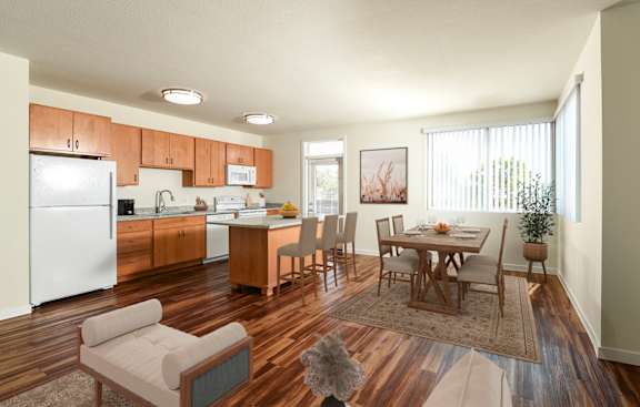 A kitchen with a dining table and chairs. at Suncrest Vista at Canyon Trails 55+ Apartments, Goodyear 85338
