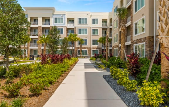 Exterior Walking Path at Osprey Park 62+ Apartments, Florida
