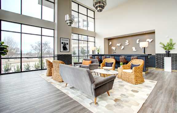 Clubhouse Living Room With Oversized Windows And Doors