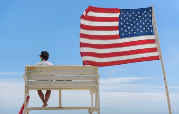 Chair And USA Flag at Pier Village Apartments, Long Branch, New Jersey