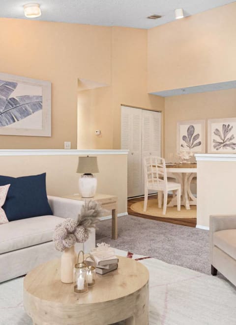 a kitchen and dining room with a table and chairs at Aria Landings, Florida