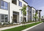 Thumbnail 2 of 34 - Exterior Photo of The Row Apartment Homes with Landscaping
