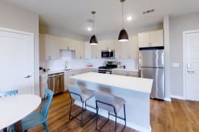 An interior picture of an apartment's kitchen