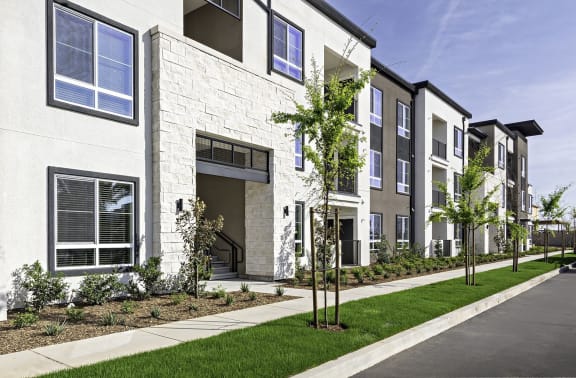 Exterior Photo of The Row Apartment Homes with Landscaping