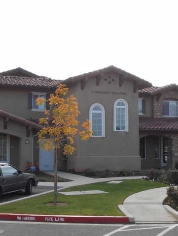Front view of building l Villa Escondido Apartments in Orange Cove CA