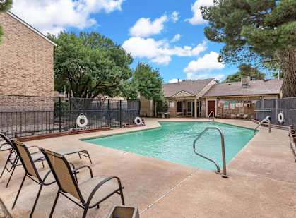 our apartments have a resort style pool with chairs