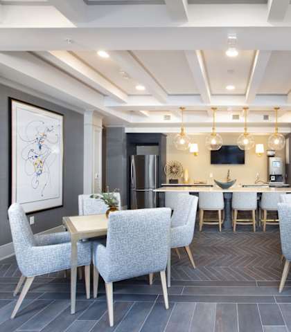 Resident café with seating area at St Mary's Square North Apartments, North Carolina