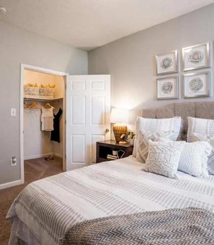 Carpeted bedroom at Champion Farms Apartments, 3700 Springhurst Blvd, 40241