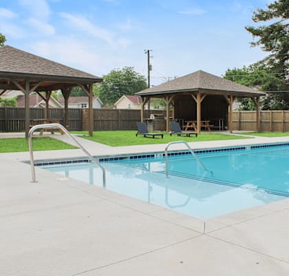 apartment complex with outdoor swimming pool