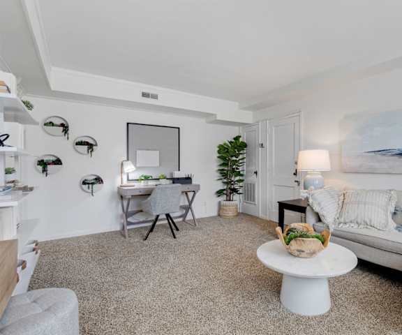 Living Room with desk at Cross Country Manor Apartments, Baltimore, MD