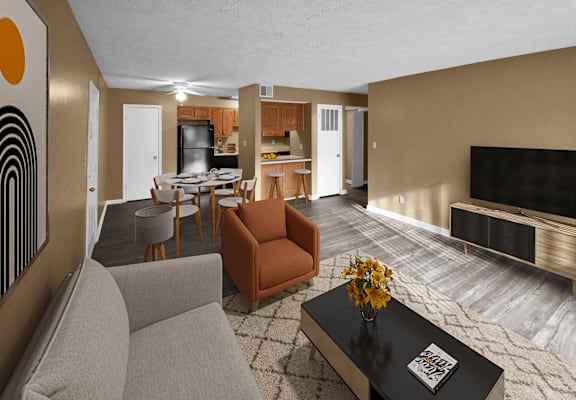 A living room and kitchen with a couch, table, and a television.