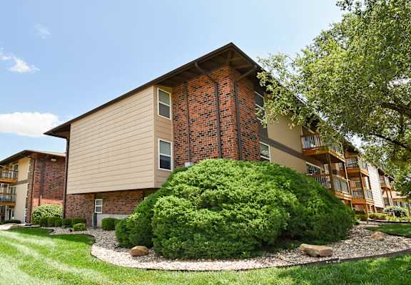 our apartments offer a beautiful yard with a large bush