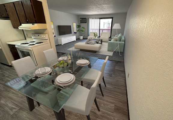 A modern dining room with a glass table and chairs.