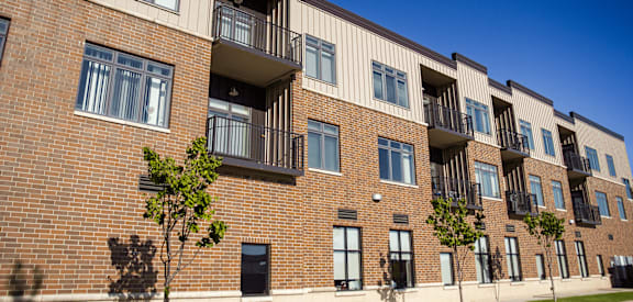 an image of a brick apartment building