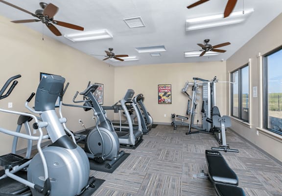 Fitness center with overhead fans at high point east apartments