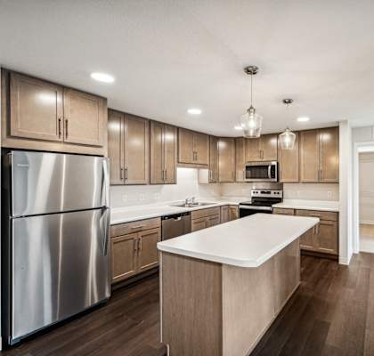 the preserve at ballantyne commons apartment kitchen with stainless steel appliances