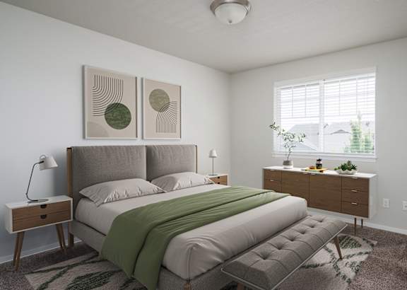 A bedroom with a large bed and two nightstands.