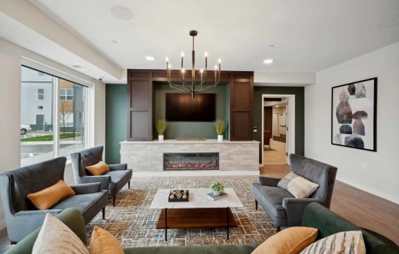 a living room with a fireplace and a tv