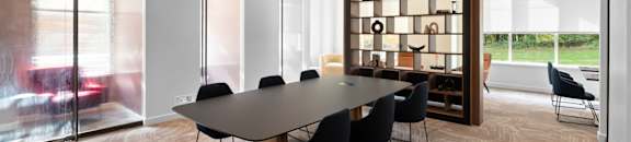 conference table for co-working space with elaborate bookshelf at Hamilton at Eagleview, Pennsylvania