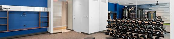 fitness area with free weights and large fan at Hamilton at Eagleview, Pennsylvania