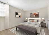 Thumbnail 1 of 9 - a bedroom with a bed and a rug at Copper and Quarry Village, Pikesville, MD, 21209