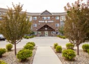 Thumbnail 1 of 80 - Bluffs leasing office entrance