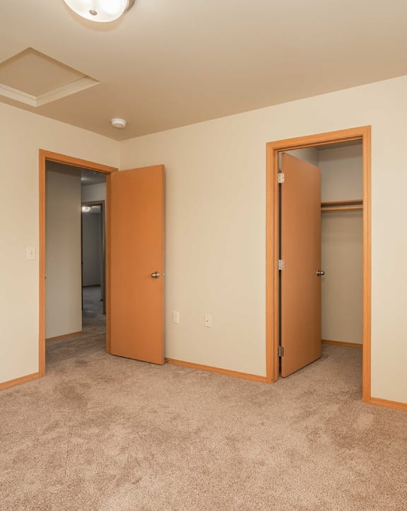 a view of the living room and dining room of a 560 square foot, 1 bedroom apartment