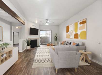 a living room with a couch and a tv