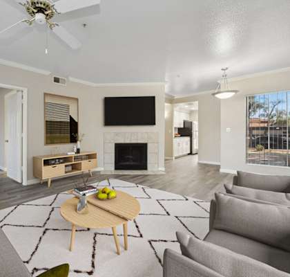 a living room with couches and a table