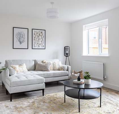 a living room with a couch and a coffee table