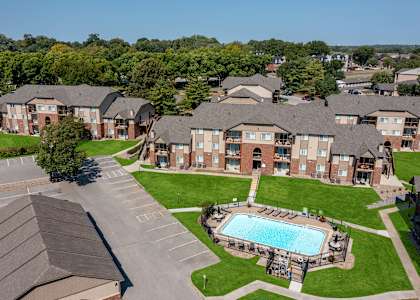Aerial view of Regency Woods community, showcasing the layout of the buildings and surrounding greenery.