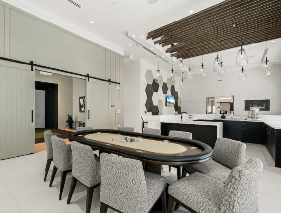a game room with a pool table and a tv at Mira at Palmer Ranch, Florida, 34238