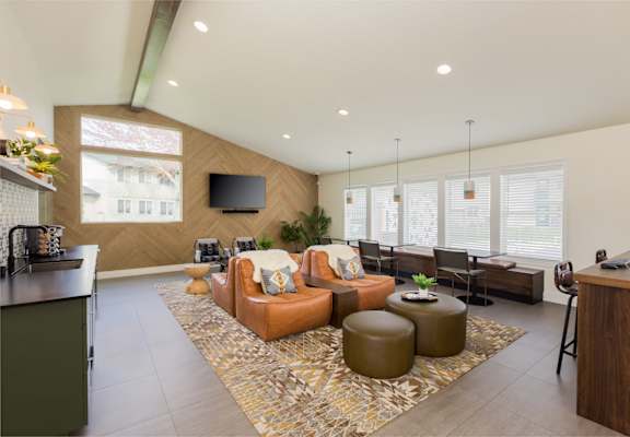Living room filled with furniture and a flat screen tv at Cedar House, WA