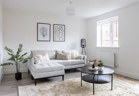 a living room with a couch and a coffee table