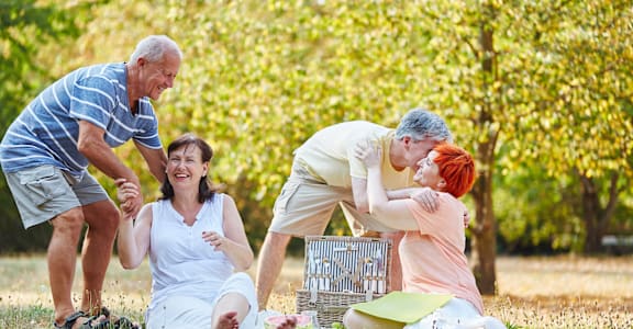a family having a picnic in a park