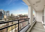 Thumbnail 50 of 67 - Large Balcony overlooks cityscape at AVIA on Pike Street, Seattle, WA