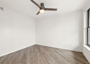 Thumbnail 64 of 67 - White room with ceiling fan at AVIA on Pike Street, Seattle, WA