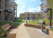 Thumbnail 17 of 17 - Building Exterior and BBQ Grill