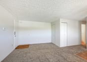 Thumbnail 6 of 12 - Carpeted Bedroom at Golden Arms Apartments, Colorado, 80401