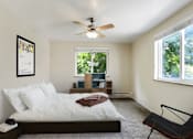 Thumbnail 14 of 14 - Bedroom With Ceiling Fan at Miners Mesa Apartments, Golden, CO, 80401