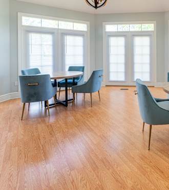 a conference room with a large table and chairs