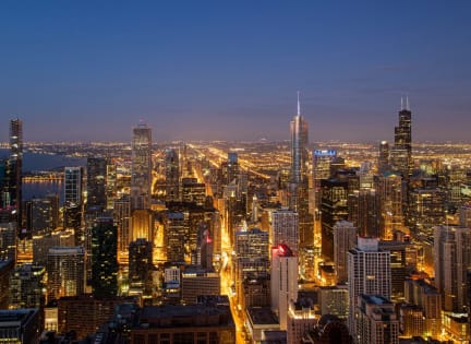 an aerial view of the city at night
