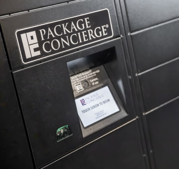 a mailbox with a package concierge sign on it